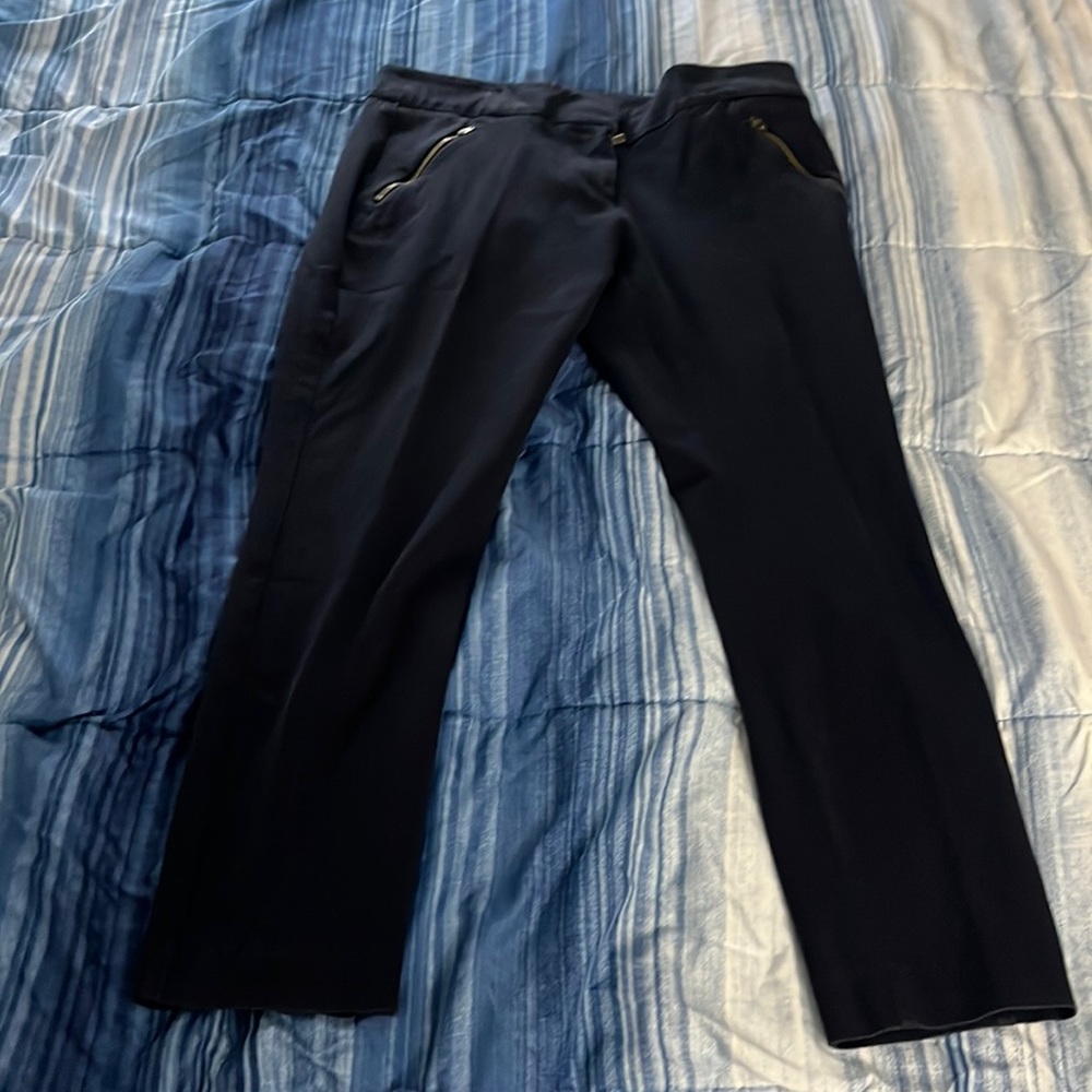 Loft size 8 womens slacks. Blue with two front zipper pockets.